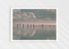 Beach Fever, a colour photographic print depicting the sky and people reflected on Saunton Sands.