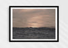 Crinkles With Colour, a colour photographic print of a peaceful ocean at Polzeath, Cornwall in a black frame.