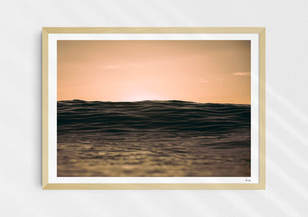 Light Life, a colour photographic print of dusk over calm ocean at Woolacombe, Devon in a wood frame.