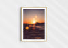 Solar Flare, a colour photographic print of sunlight on the ocean at Porthtowan, Cornwall in a wood frame.
