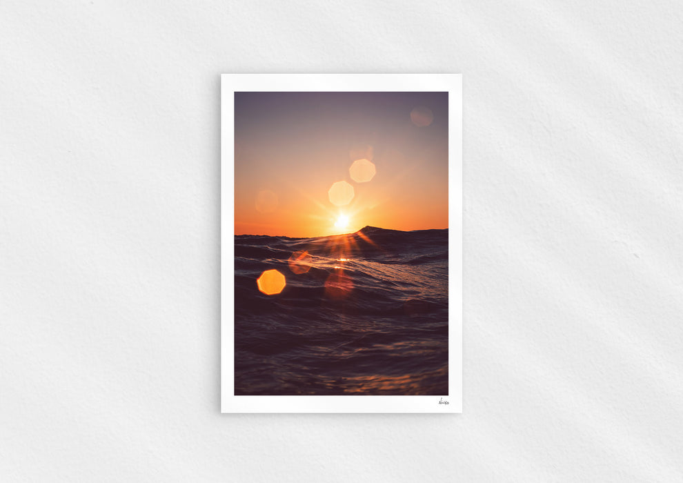 Solar Flare, a colour photographic print of sunlight on the ocean at Porthtowan, Cornwall.