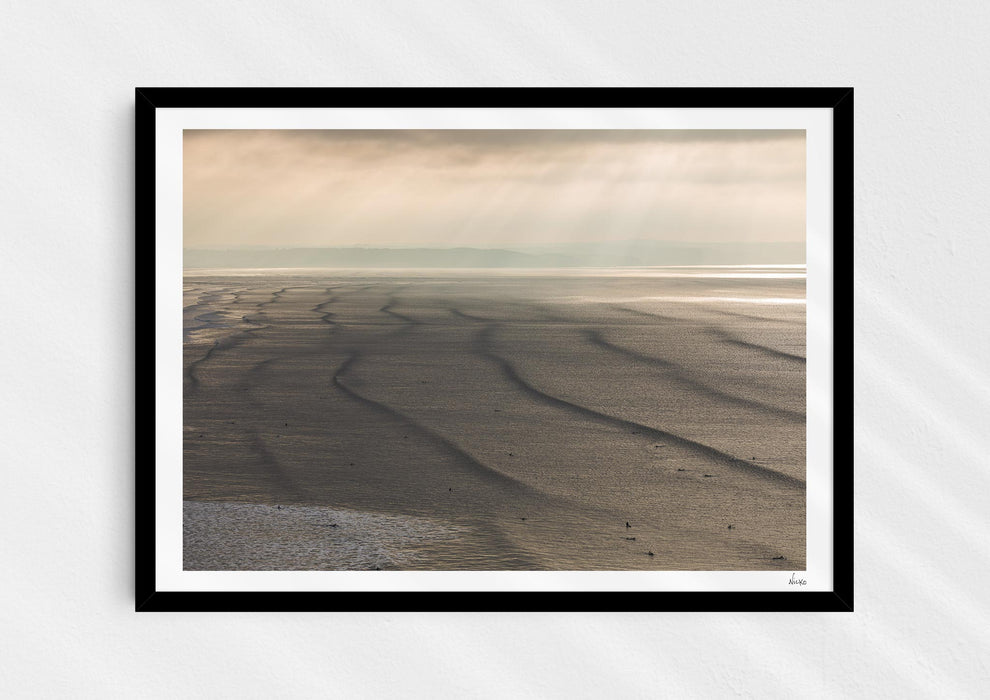 Splice Your Lines, a colour photographic print of lines of swell at Saunton Sands in a black frame.