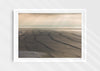 Splice Your Lines, a colour photographic print of lines of swell at Saunton Sands in a white frame.